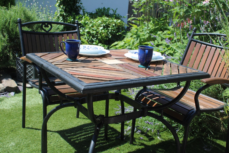 Private garden with outdoor seating at Kibble Cottage